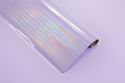 Упак. материал флористическая пленка, с голографическими надписями, 70 мкр, 58 см х 10 м, св-сиреневый