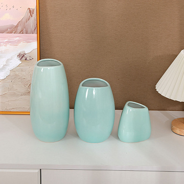 Набор керамических ваз 3 шт.: 12,7*18,5*7,7/10,5*10,5*5,4/11,9*24*7 см.,  цвет нежно-голубой