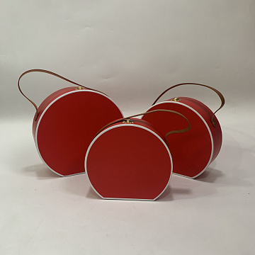 Набор коробок с ручкой из экокожи 27x25x10,2 см, 24x22x8,7 см, 21x19x7,2 см, 3 шт., красный